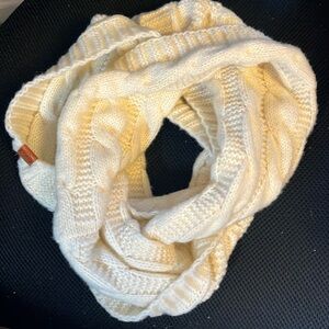 Cream infinity scarf.  Thick cable knit. acrylic.